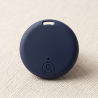CozyPaws Mini Bluetooth Pet Tracker Tag in deep blue with location button and collar attachment hole - Image 5