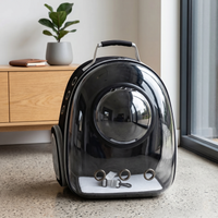 CozyPaws™ space capsule cat backpack black front view — central bubble dome, triple ventilation holes at base, internal safety leash clip and padded top carry handle on white background - Image 3