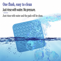 CozyPaws™ Lick Mat being rinsed under water – easy-clean food-grade silicone, dishwasher safe - Image 2