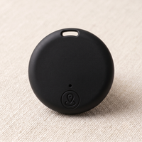 CozyPaws Mini Bluetooth Pet Tracker Tag in black with location button and collar attachment hole - Image 6