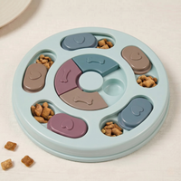 CozyPaws dog puzzle feeder in blue with colour-coded sliding pieces and kibble — top view - Image 5