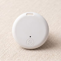 CozyPaws Mini Bluetooth Pet Tracker Tag in white with location button and collar attachment hole - Image 7