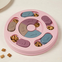 CozyPaws dog puzzle feeder in pink with colour-coded sliding pieces and kibble — top view - Image 6