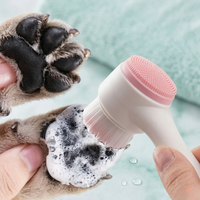 CozyPaws™ Silicone Dog Brush scrubbing muddy dog paw with foam – 2-in-1 soft bristle paw cleaner in action
 - Image 8